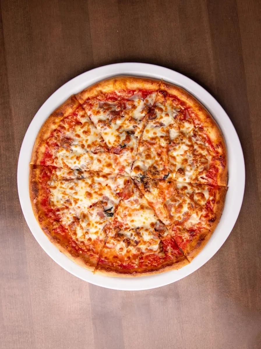 Meat Lovers Pizza &ndash; loaded Italian pizza at THE PIZZA SPOT Spruce Grove and WEM Edmonton